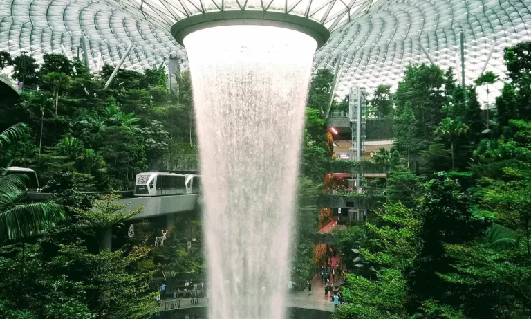 Jewel changi airport interior representing singapore's status as the premier financial hub for wealth preservation. Cnb trustee provides cross-border trust solutions for clients in singapore, jakarta, bangkok, and kuala lumpur